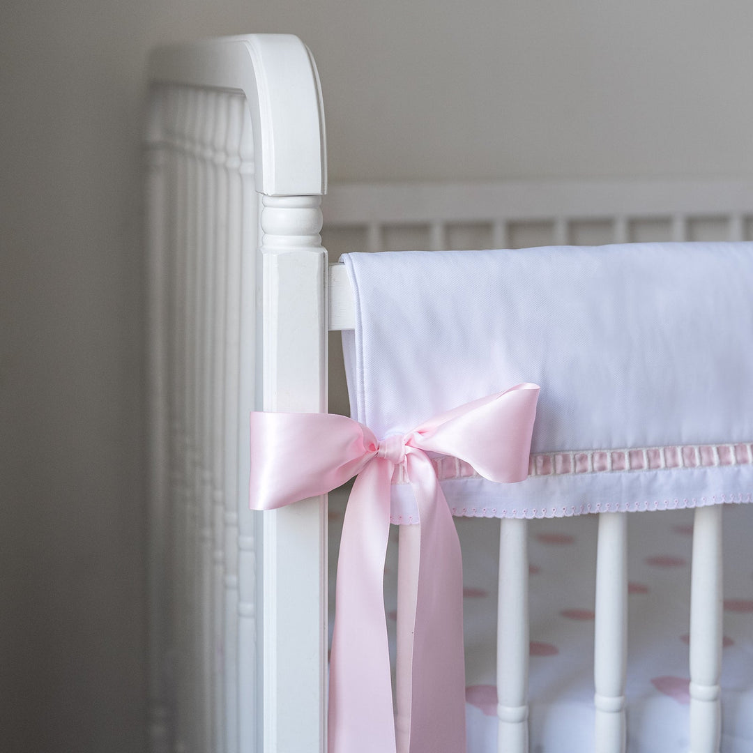 White Pique Crib Rail Topper with Pink Ribbon