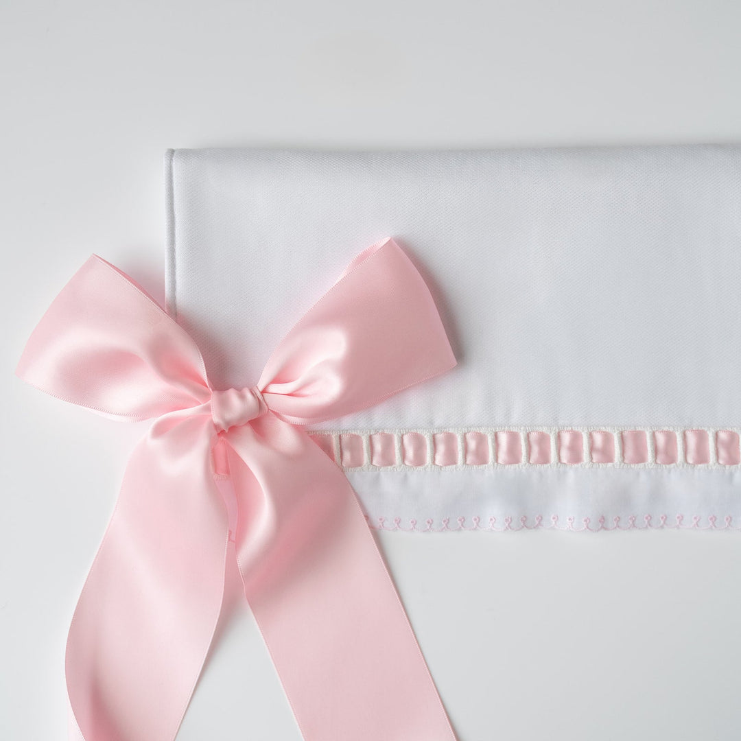 White Pique Crib Rail Topper with Pink Ribbon