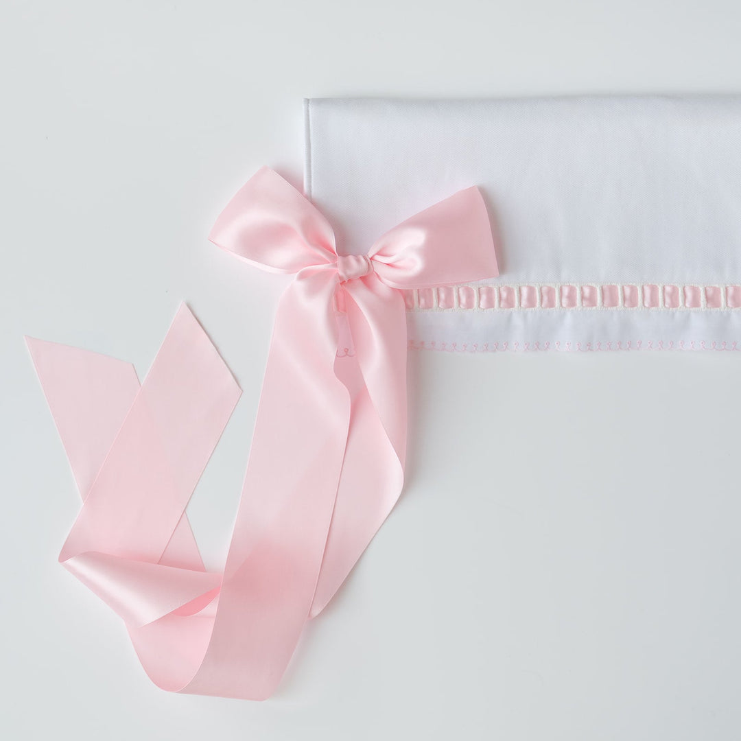 White Pique Crib Rail Topper with Pink Ribbon