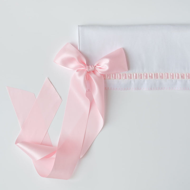 White Pique Crib Rail Topper with Pink Ribbon
