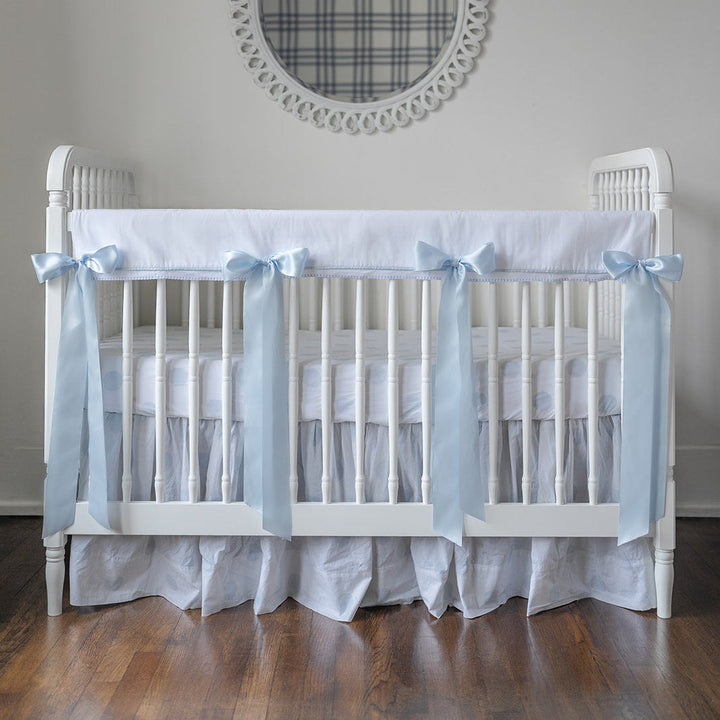 White Pique Crib Rail Topper with Blue Ribbon
