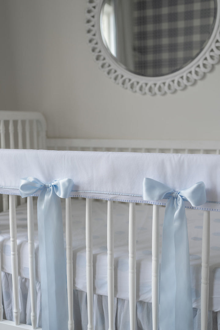White Pique Crib Rail Topper with Blue Ribbon